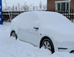 2024春运特写：冻雨暴雪困住自驾游子，特斯拉Model Y电量骤降引发关注